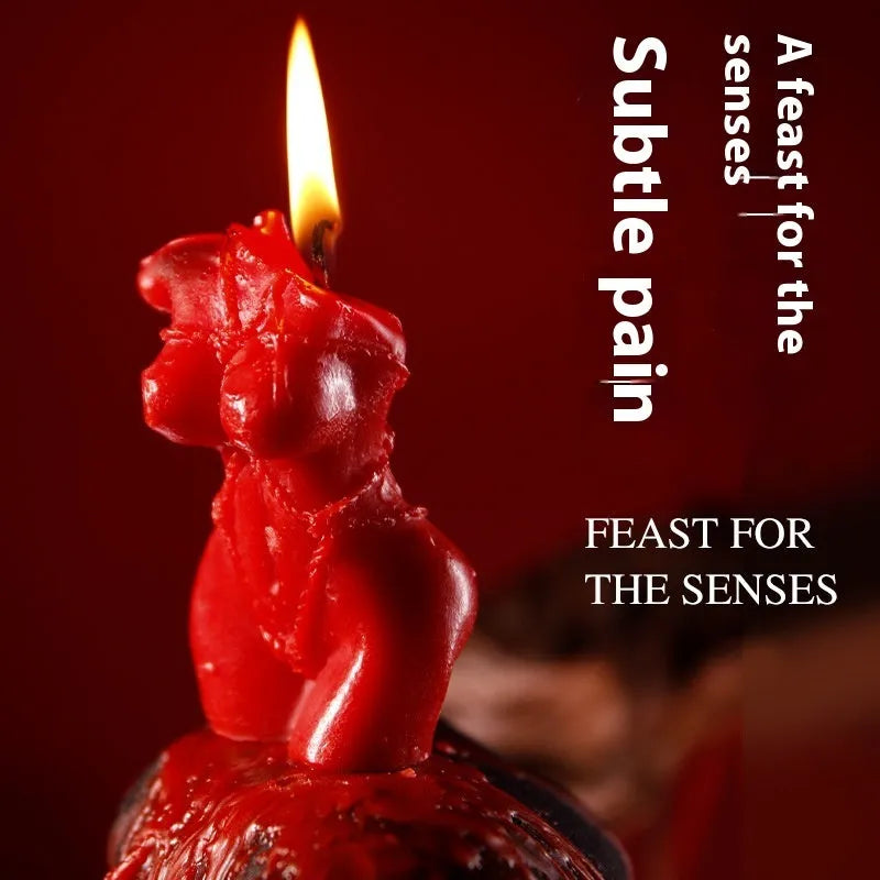 Soy wax low temperature massage candles in red, pink, and purple colours.