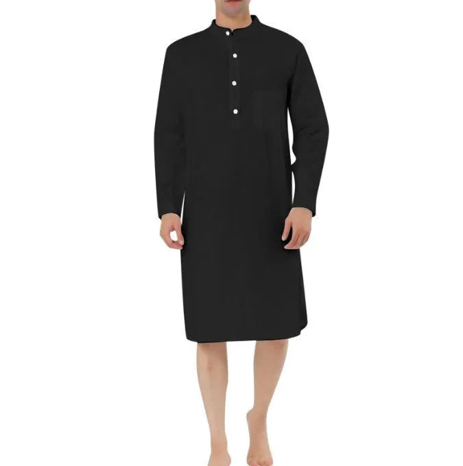 Man wearing a light blue cotton shirt-style robe with front pockets, showcasing casual loungewear.