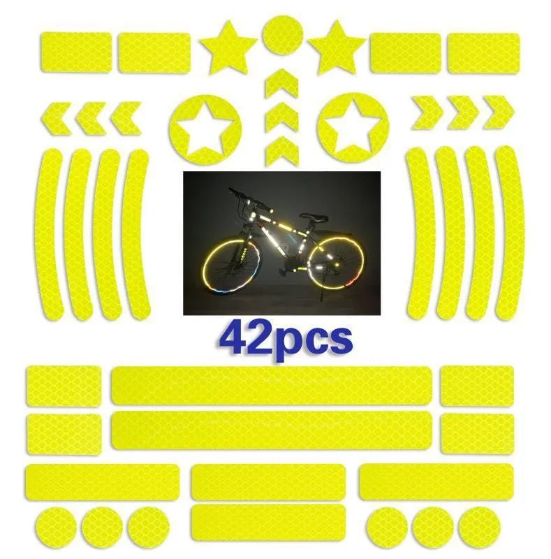 Reflective bicycle safety tape with a geometric grid pattern, shown in red, yellow, blue, and white colours.