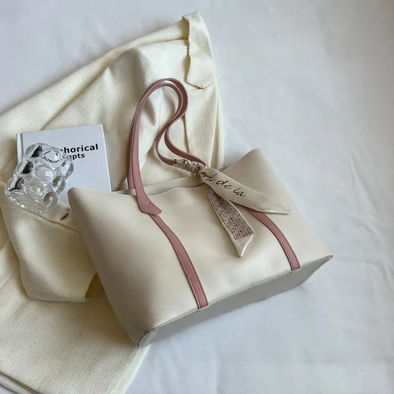 Canvas bucket tote bag with crossbody strap showing sandwich pocket organisation and soft construction