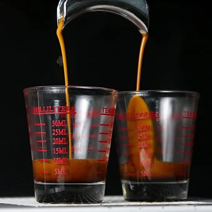 30ml mini retro glass with measurement scale in black colour option on a table