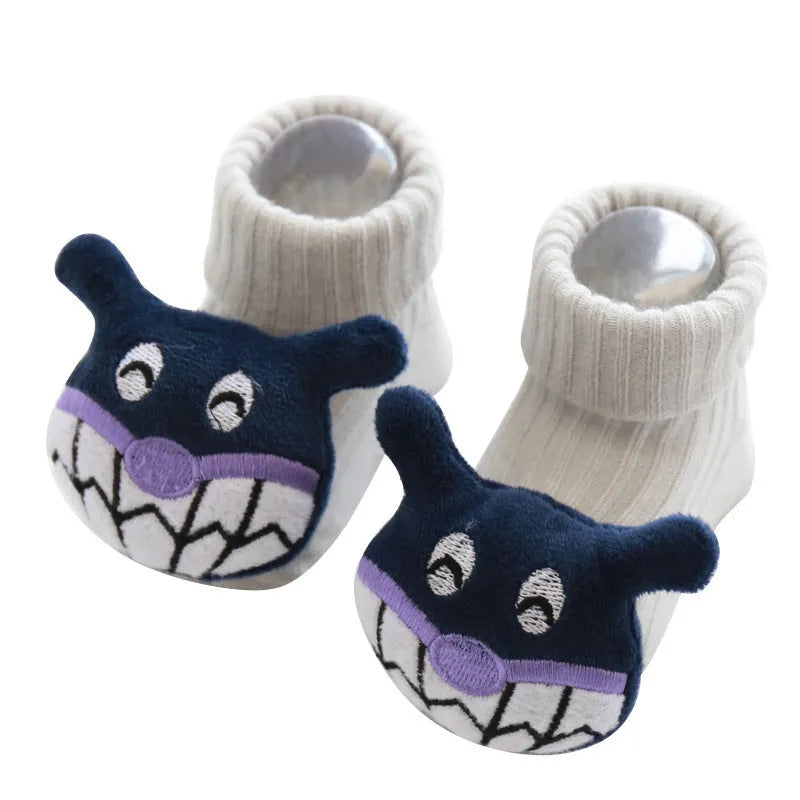 Cotton baby floor socks in various colours and patterns with size guide for ages 0-3 months