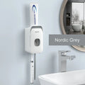 Automatic toothpaste dispenser in blue colour made from ABS plastic with a wall-mount design.