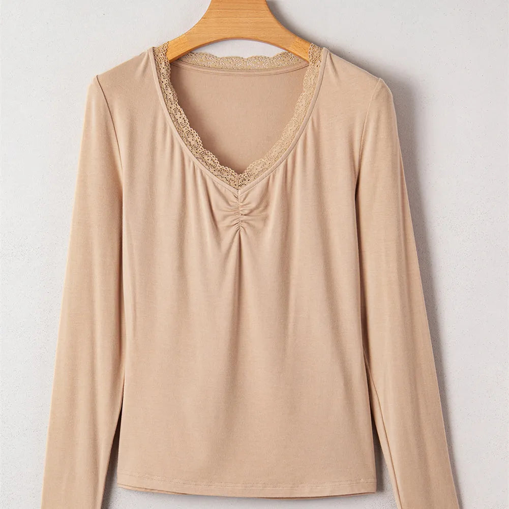 Women's red slim fit long sleeve casual pullover top on a hanger.