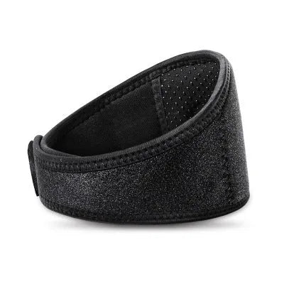 Black self-heating magnetic neck guard with adjustable shoulder strap on a grey background.