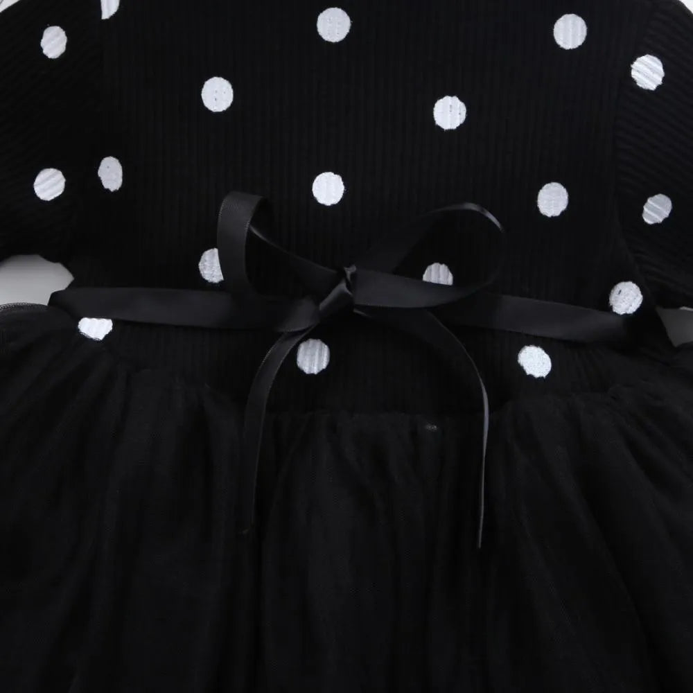 Baby girl's long sleeve black tutu lace dress for birthday parties and christenings.
