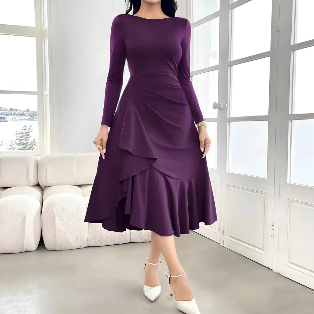 Purple women's long sleeve dress with round neck, ruffles, and mid-waist design on hanger