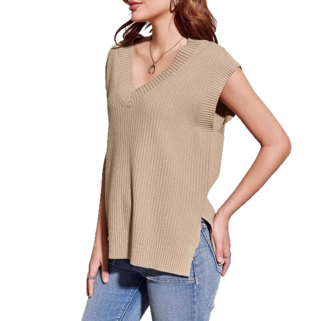 Camel and white loose v-neck sleeveless vest with striped or plaid pattern.