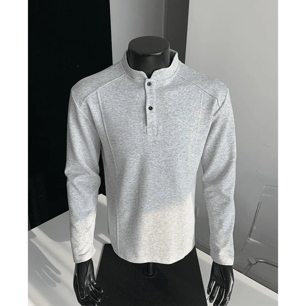 Men's grey asymmetrical stand-up collar cotton polo shirt with patchwork shoulder detail.