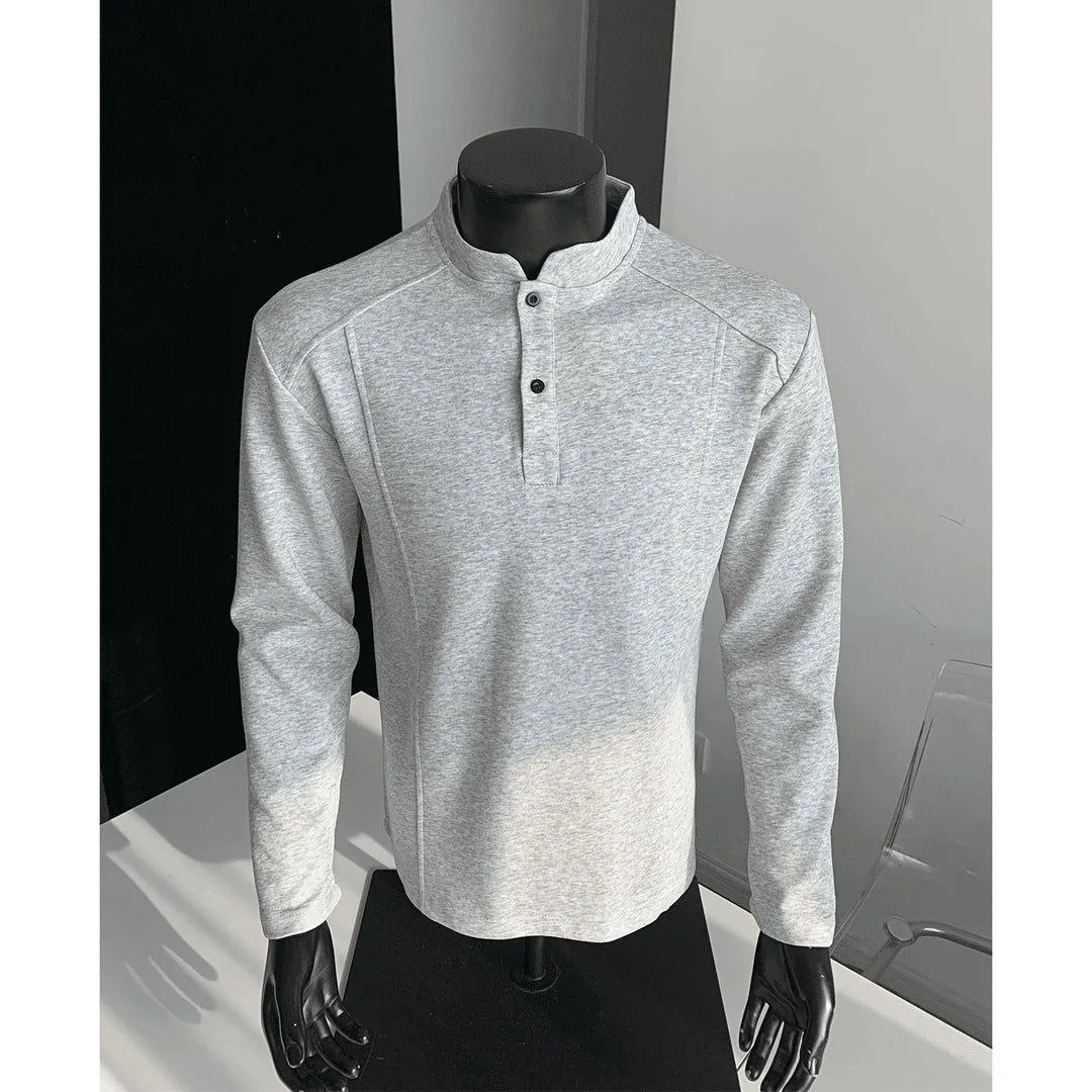 Men's grey asymmetrical stand-up collar cotton polo shirt with patchwork shoulder detail.