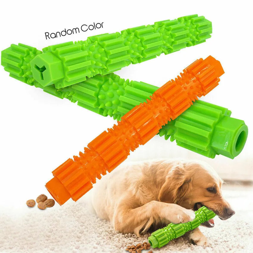 Green and orange durable rubber dog chew toy with squeaker and treat-dispensing hole.