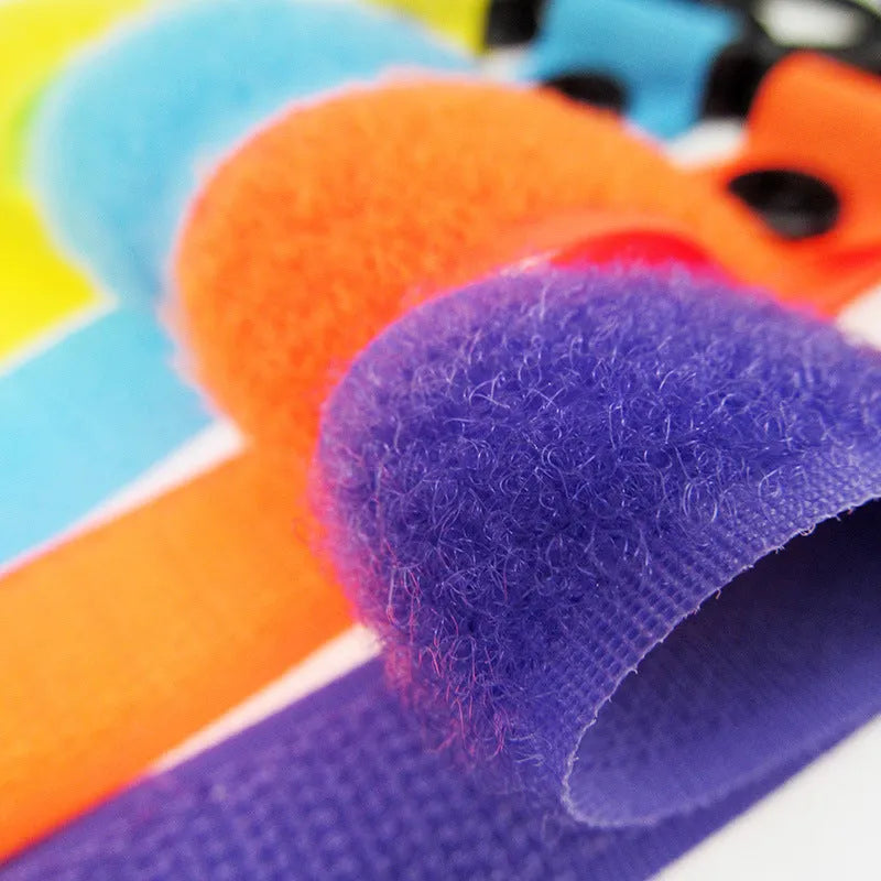 Nylon luggage hook in one of 18 available colours, including black, red, blue, and green variants