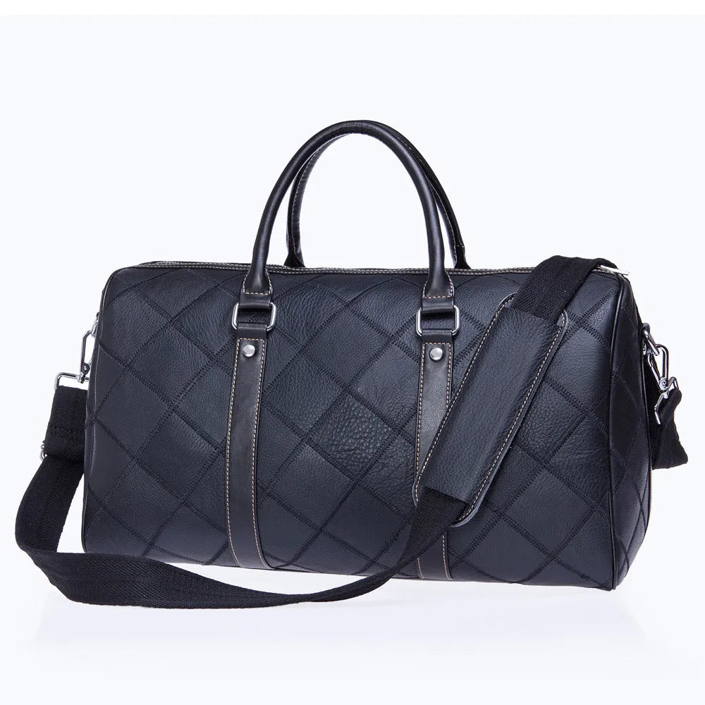 Men's vintage leather duffel bag in black showing internal phone and ID pockets.