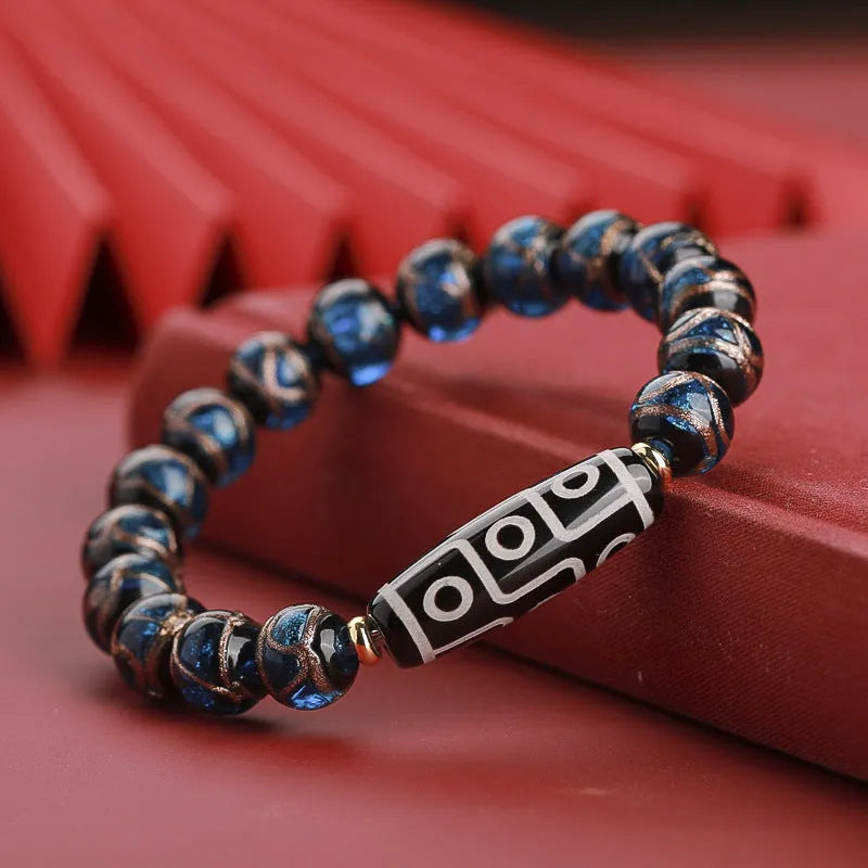 Handcrafted Chinese coloured glaze bracelet with snake year beads in auspicious patterns