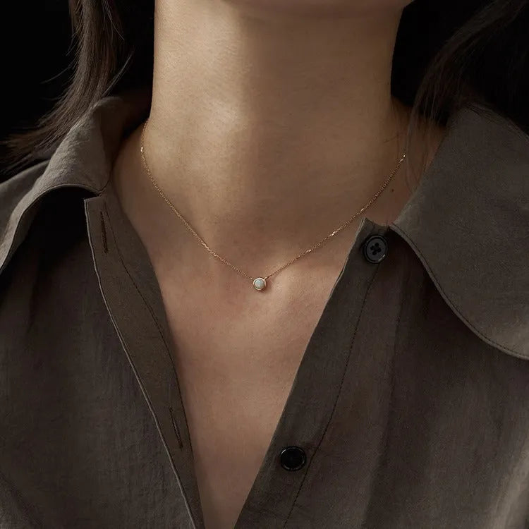 Geometric oval S925 silver pendant necklace with jelly opal gemstone detail