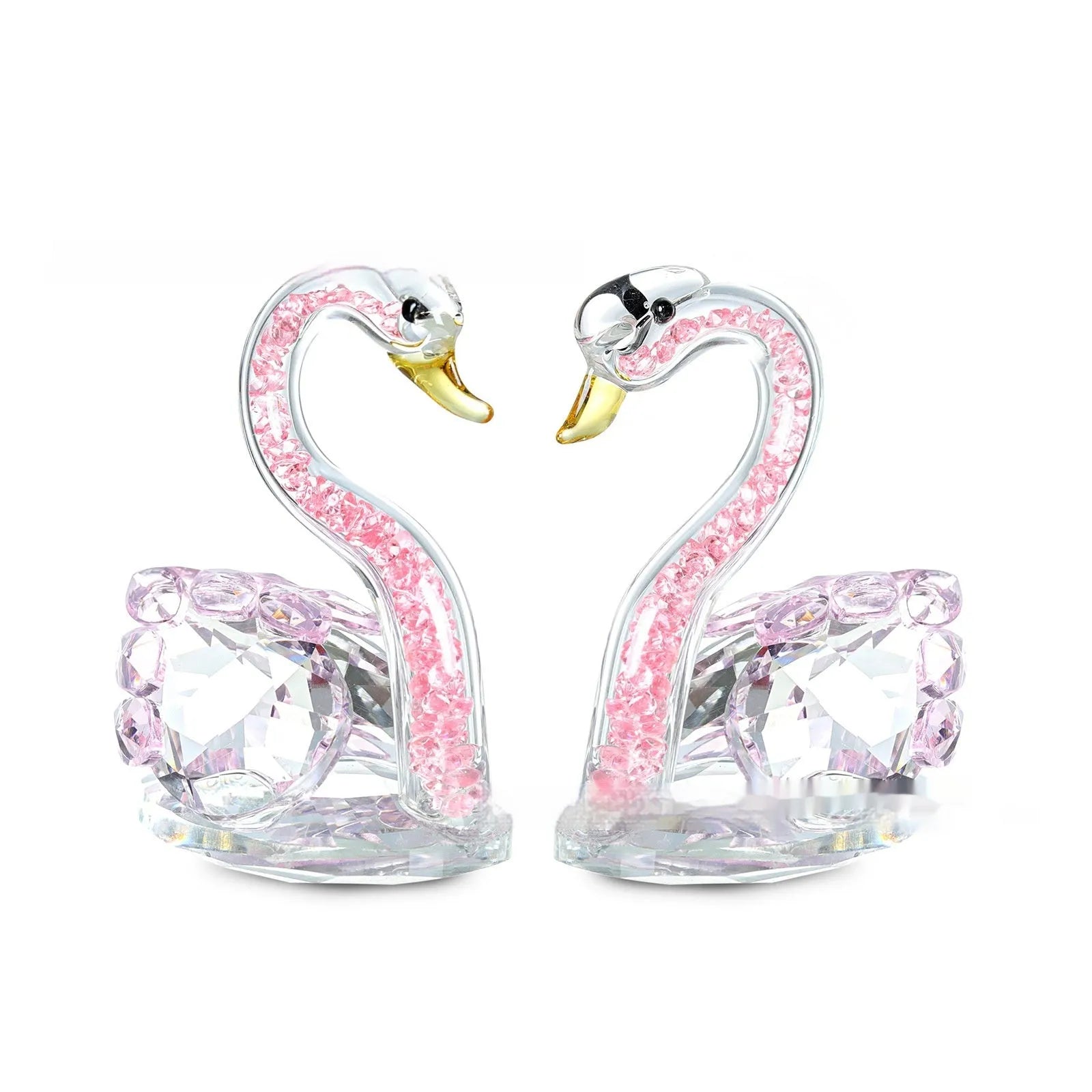 White crystal swan ornament on a desktop, shown in solid head and empty tube styles in red, blue, pink, and purple.