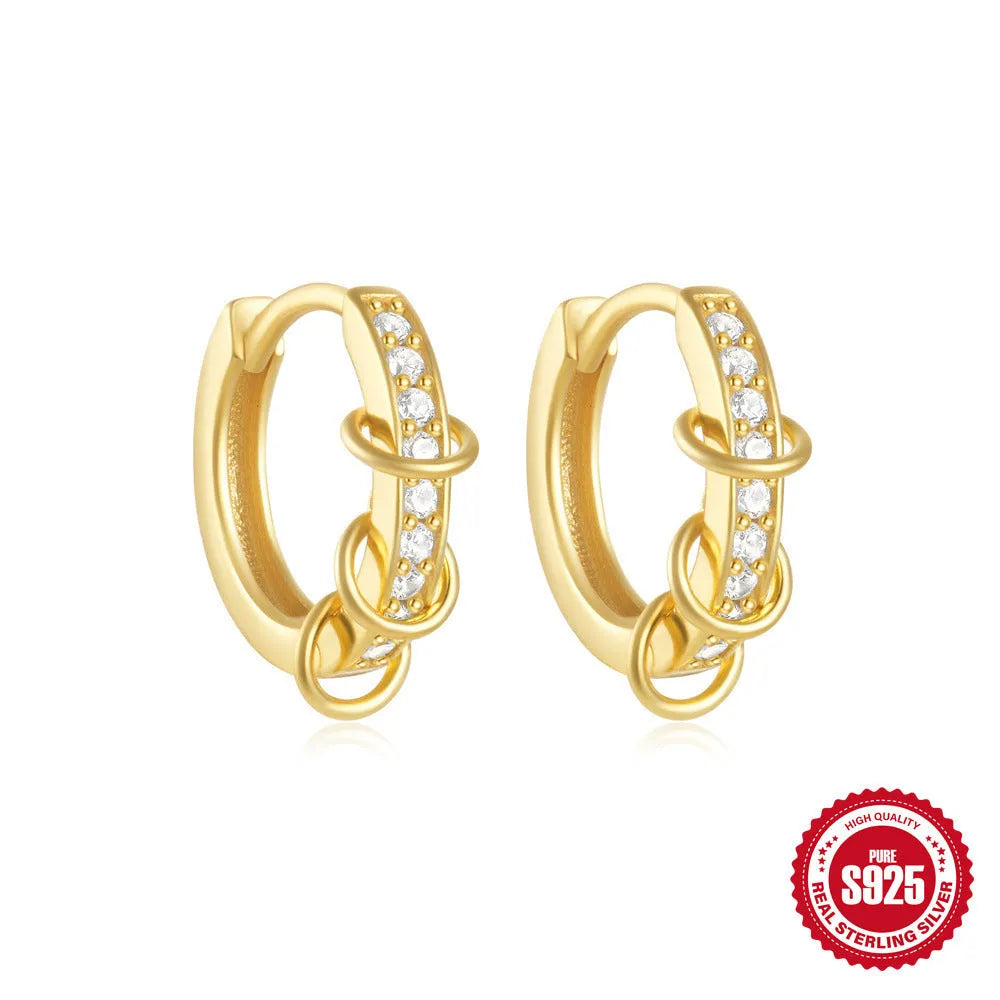 Sterling silver geometric stud earrings with round diamond accents in gold and silver electroplated finishes