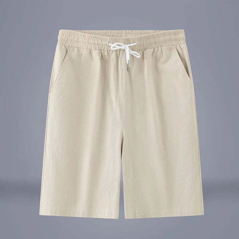 Chinese style solid colour cropped pants in cotton linen fabric on a neutral background.
