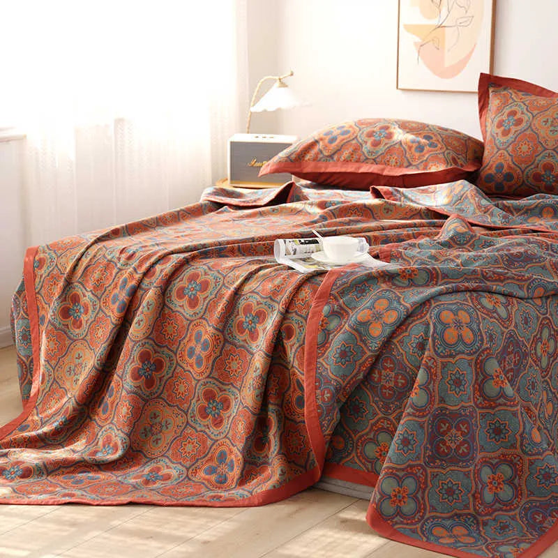 Cotton gauze bed blanket set with floral pattern including blanket and two pillowcases