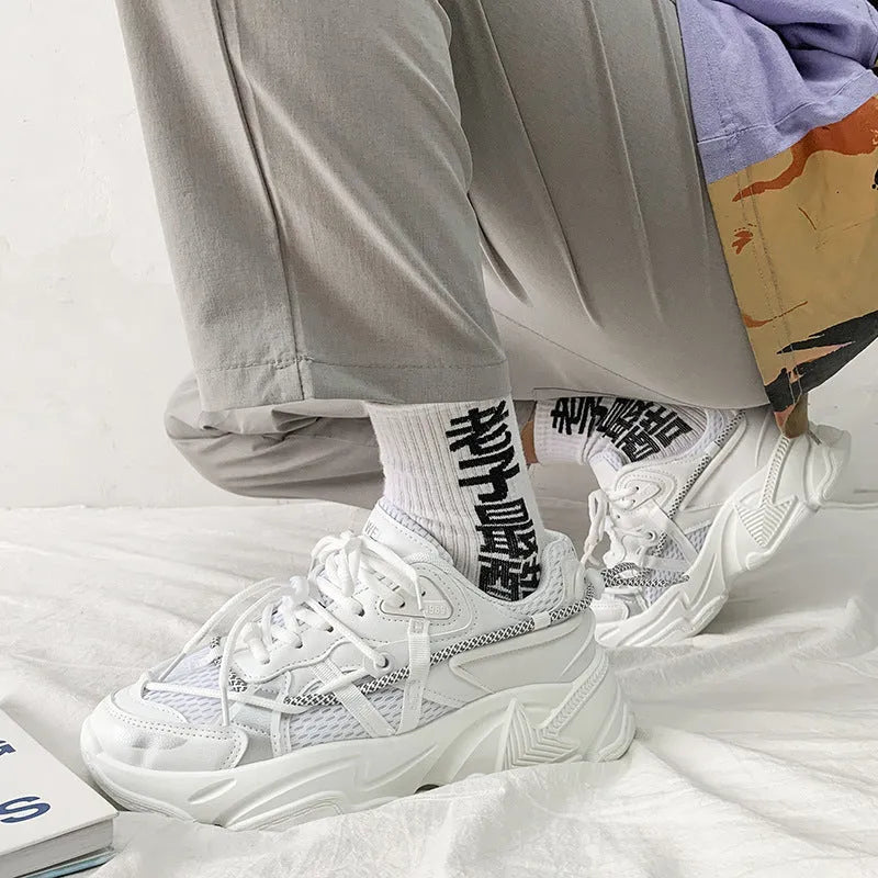 Men's white Korean dad style platform trainers with lace-up front and mesh lining.