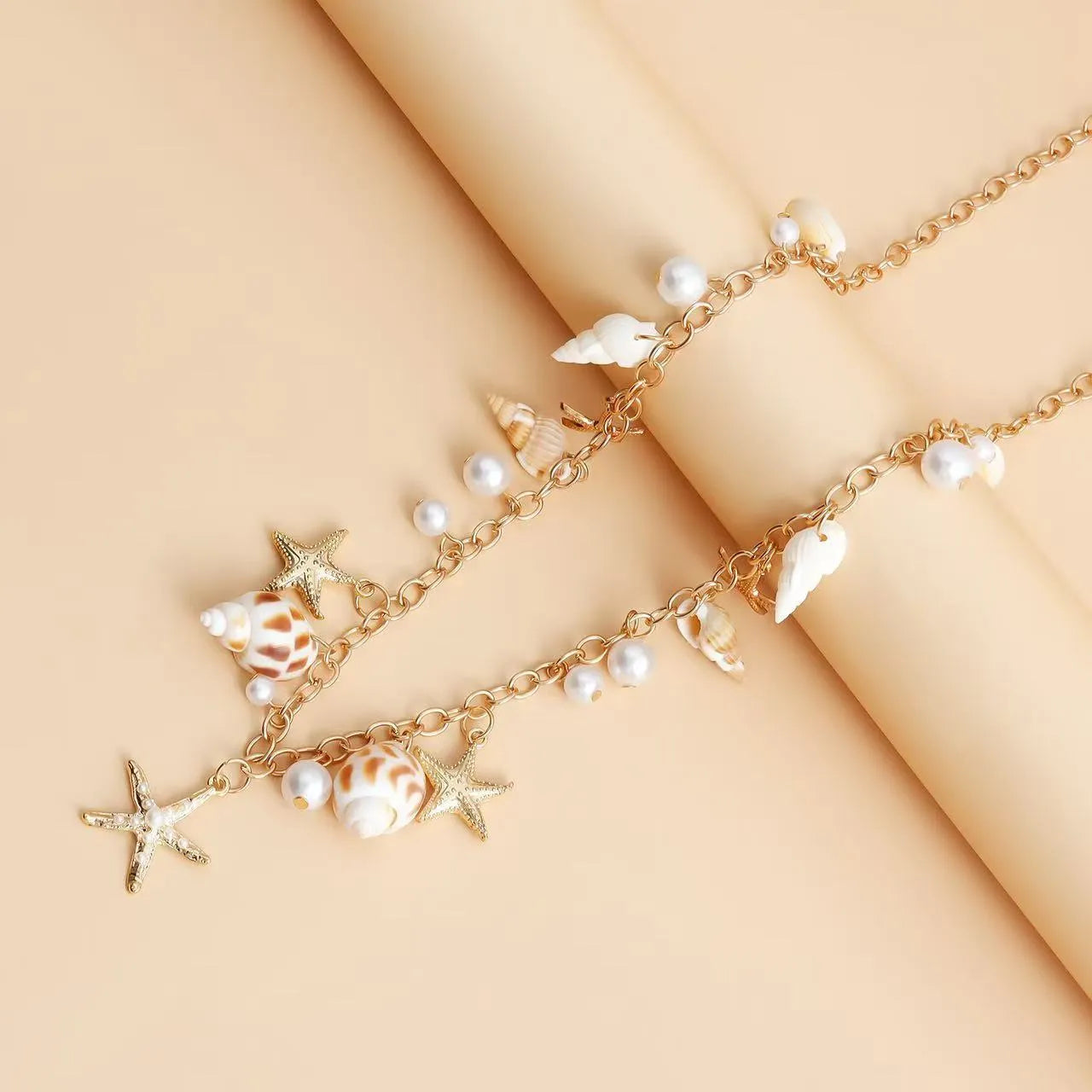 Women's alloy waist chain and bracelet set with star shaped charms for summer jewellery