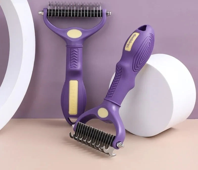 Purple plastic double-sided pet comb for untangling knots on dog and cat fur.