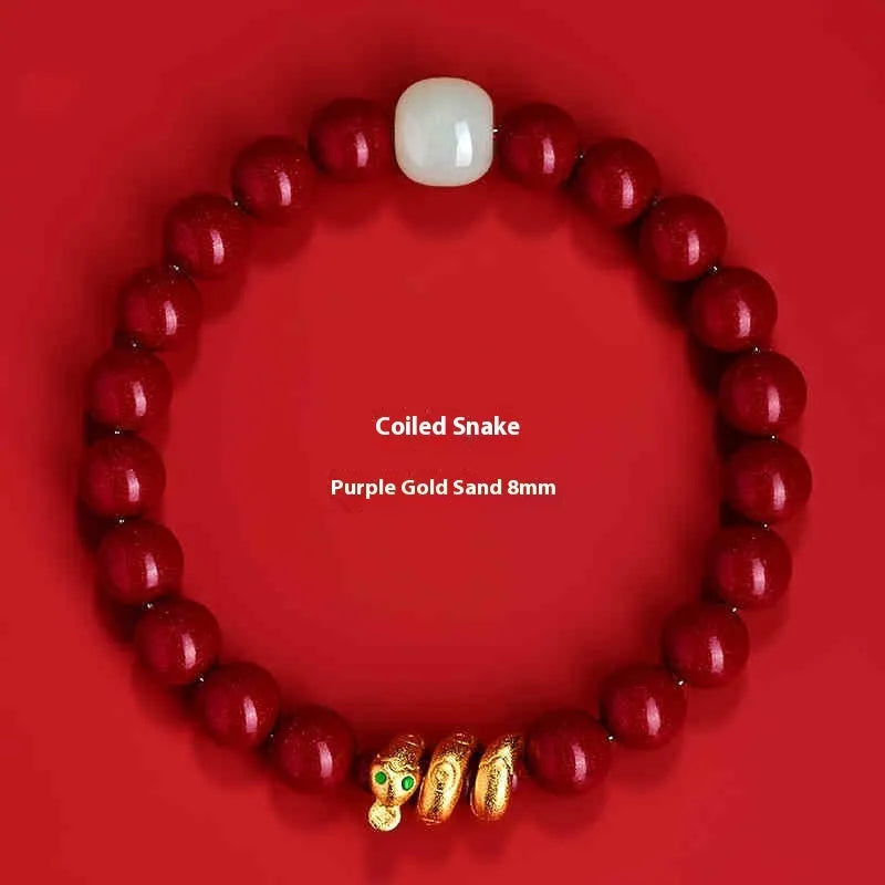 Handmade red cinnabar bracelet with snake zodiac beads, shown in 6mm and 8mm size options.