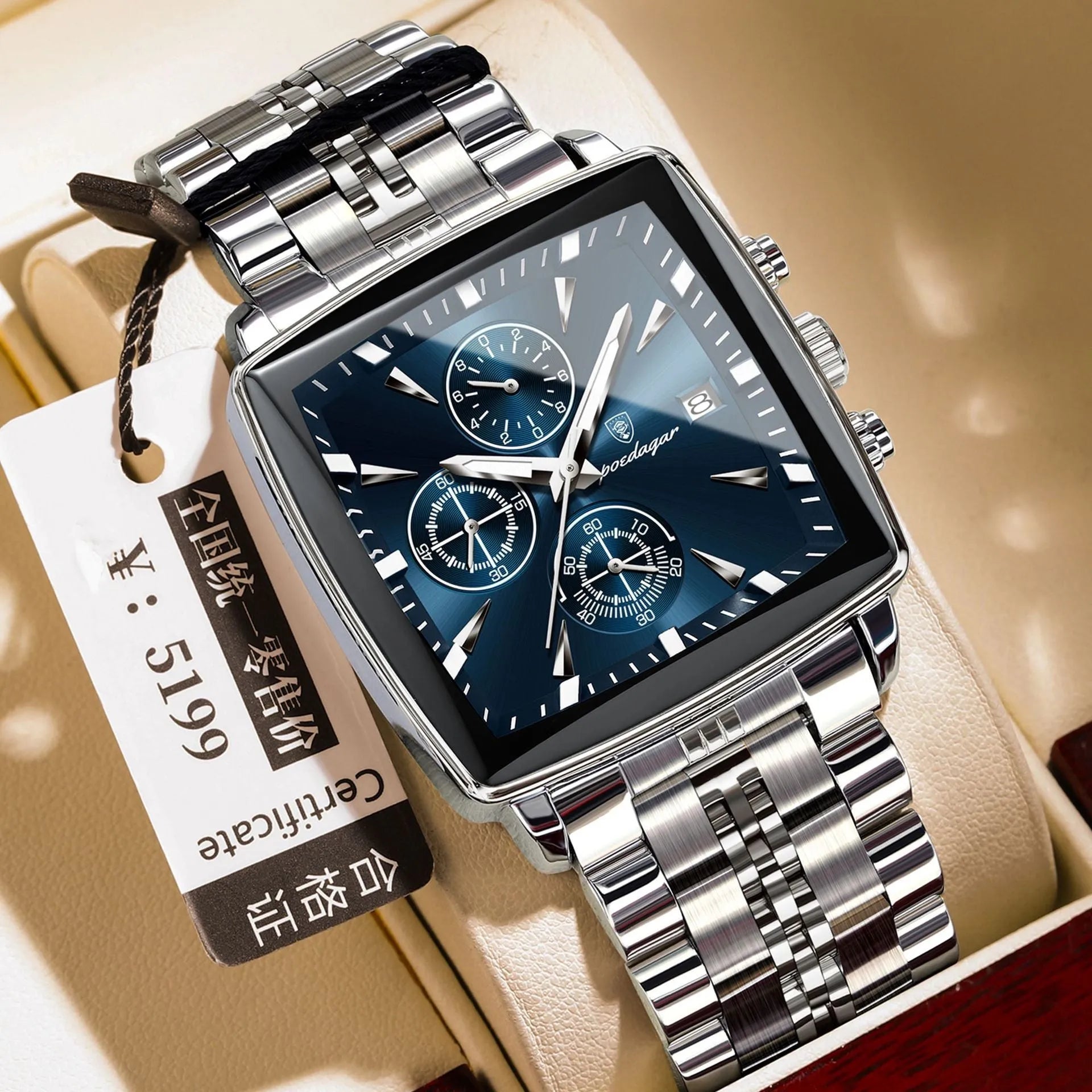 Square men's business quartz watch with stainless steel band and butterfly buckle in gold and blue colour combination.