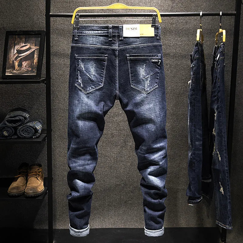Men's slim-fit blue jeans with micro-elastic denim fabric on hanger
