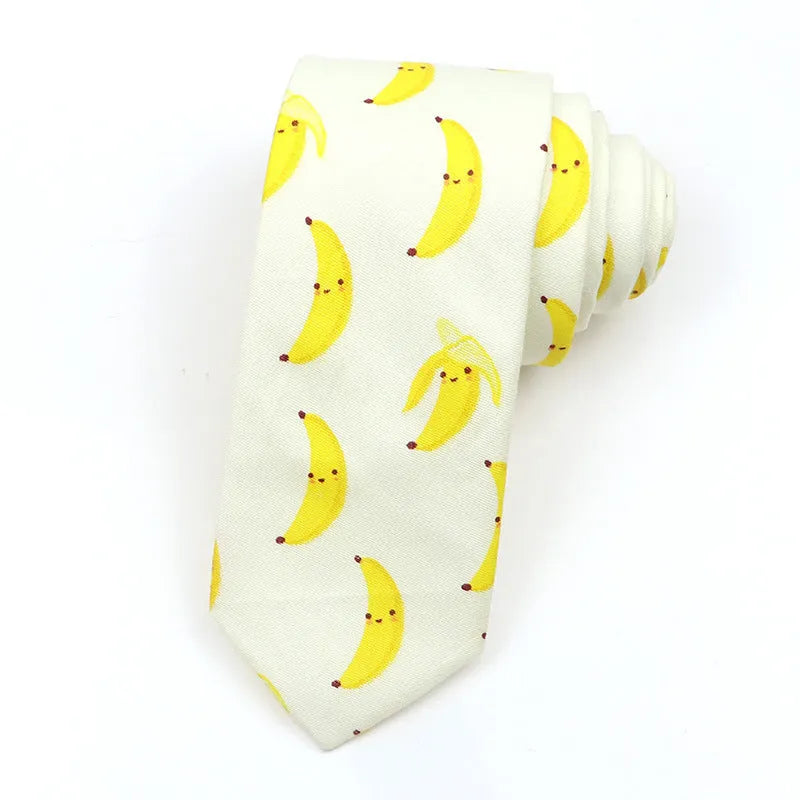 Men's narrow cotton bow tie in a cartoon print with an adjustable knot, shown in a selection of colours.