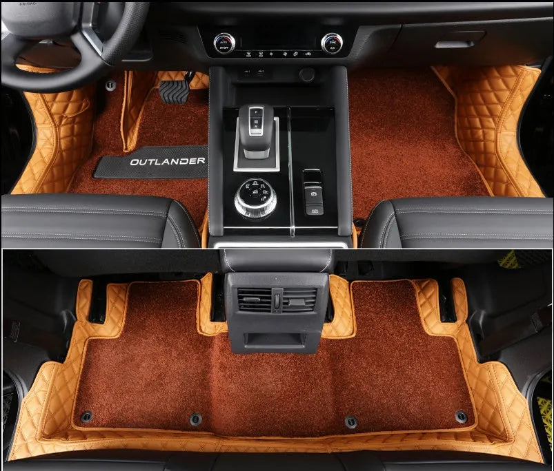 Custom black PU floor mats installed in a Mitsubishi Outlander footwell.