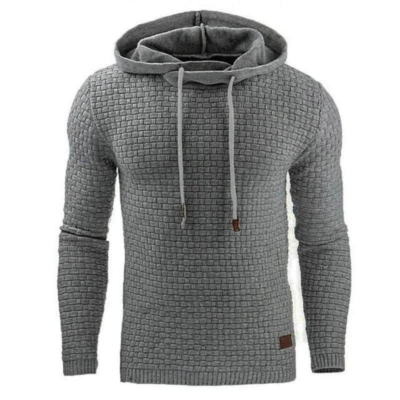 Men's black cotton-polyester blend hooded sweatshirt on a hanger, showcasing the front hood and kangaroo pocket.