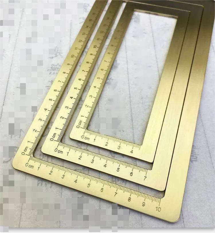 Solid brass calligraphy paper weight with carved square design for paper pressing