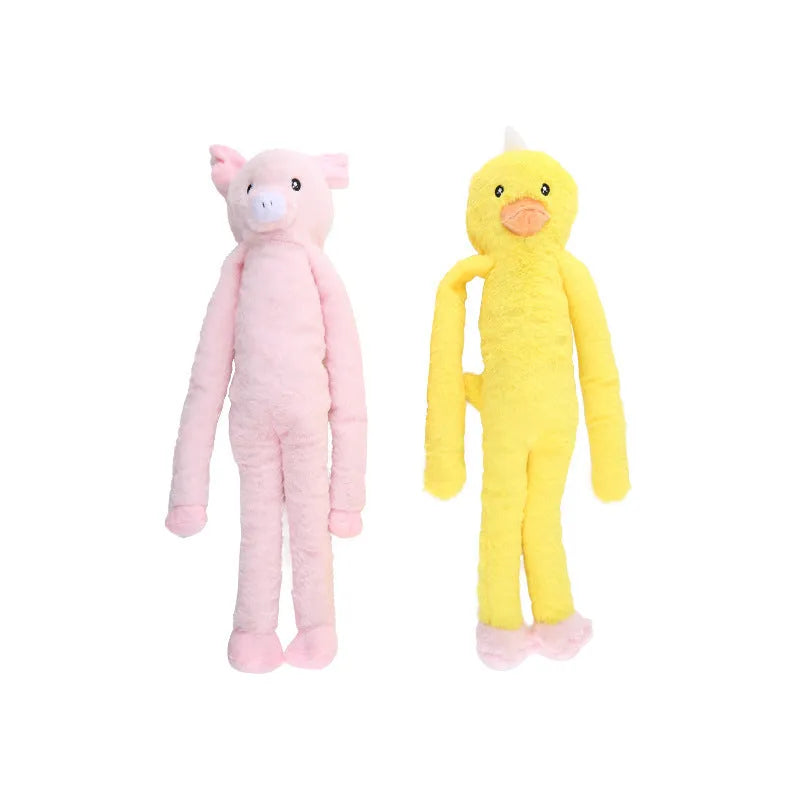 Large pink and yellow plush dog toy with paper texture for golden retriever chewing and dental care