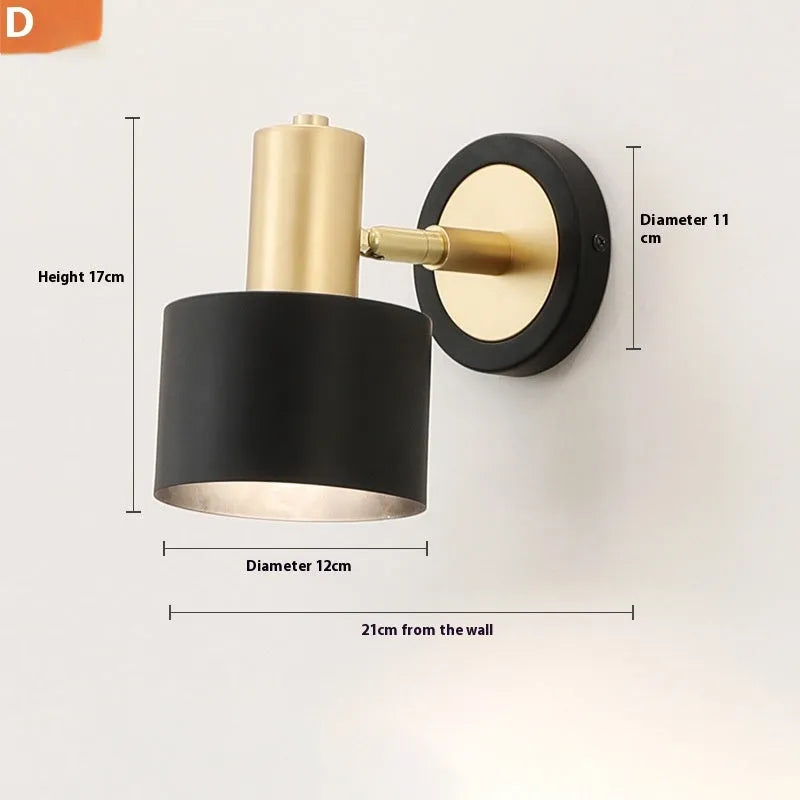 Nordic-style iron wall lamp mounted beside a bed with adjustable LED lighting