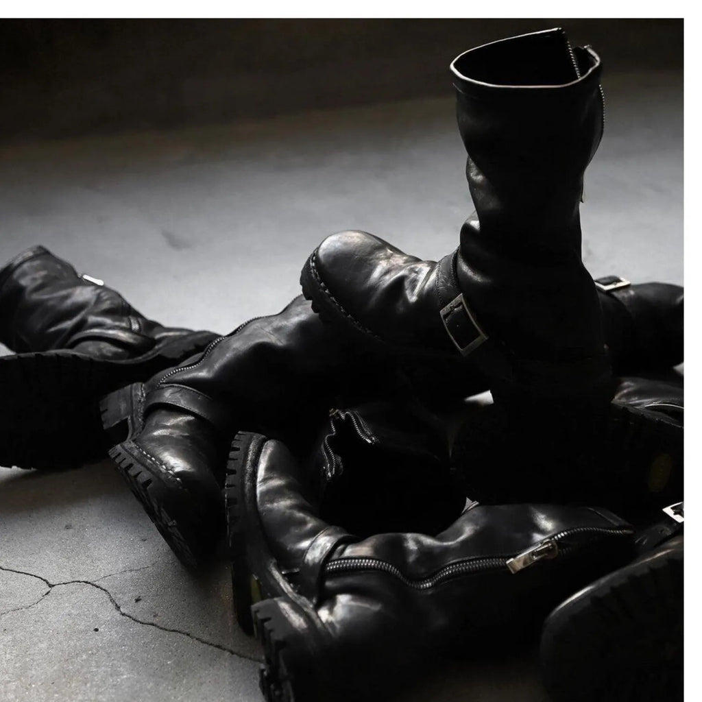 Men's black retro Martin ankle boots with a side zip and round toe.