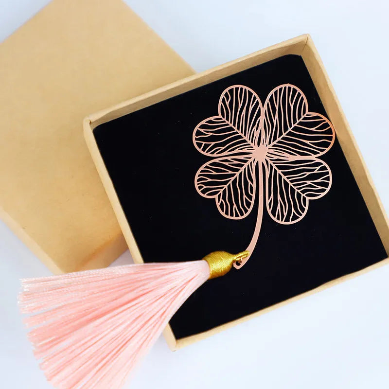 Brass bookmark with hollow-cut leaf design and matching rose gold metal tassel