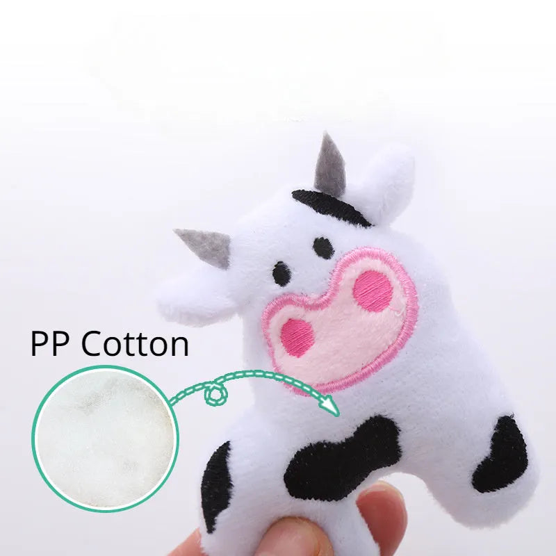 Plush cat toy in the shape of a cow, filled with catnip for interactive play with pets.