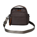 Vegan leather crossbody bag in black with double-stitched contrast thread, YKK zippers, and reinforced base