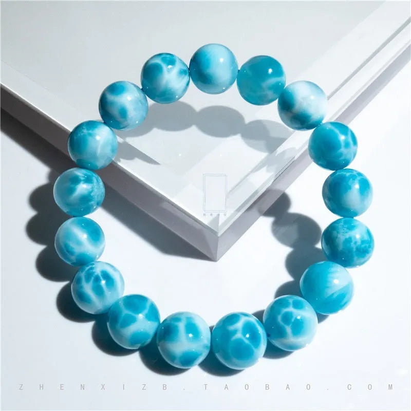 Blue bodhi bracelet with natural crystal sea-pattern stone and pearl accents in Maillard style arrangement