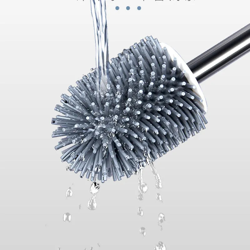 Portable toilet brush with soft silicone bristles and wall-mounted holder for bathroom cleaning