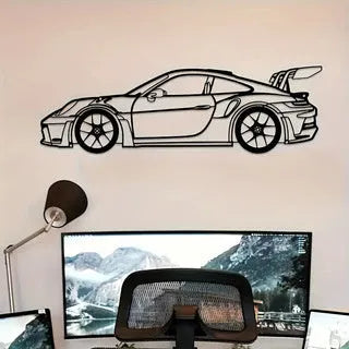 Black iron sports car wall art decoration on a white wall