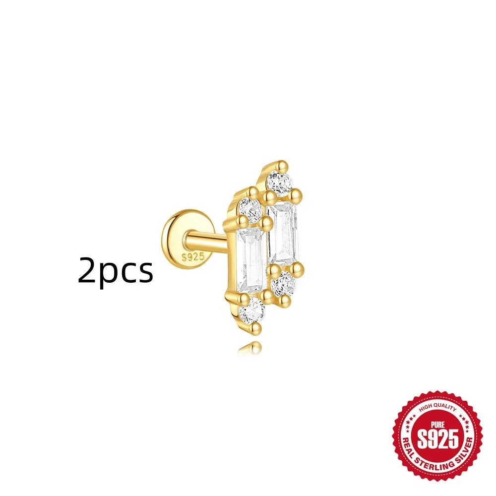 S925 sterling silver geometric kite earring with rhinestones and a chain tassel in a gold colour.