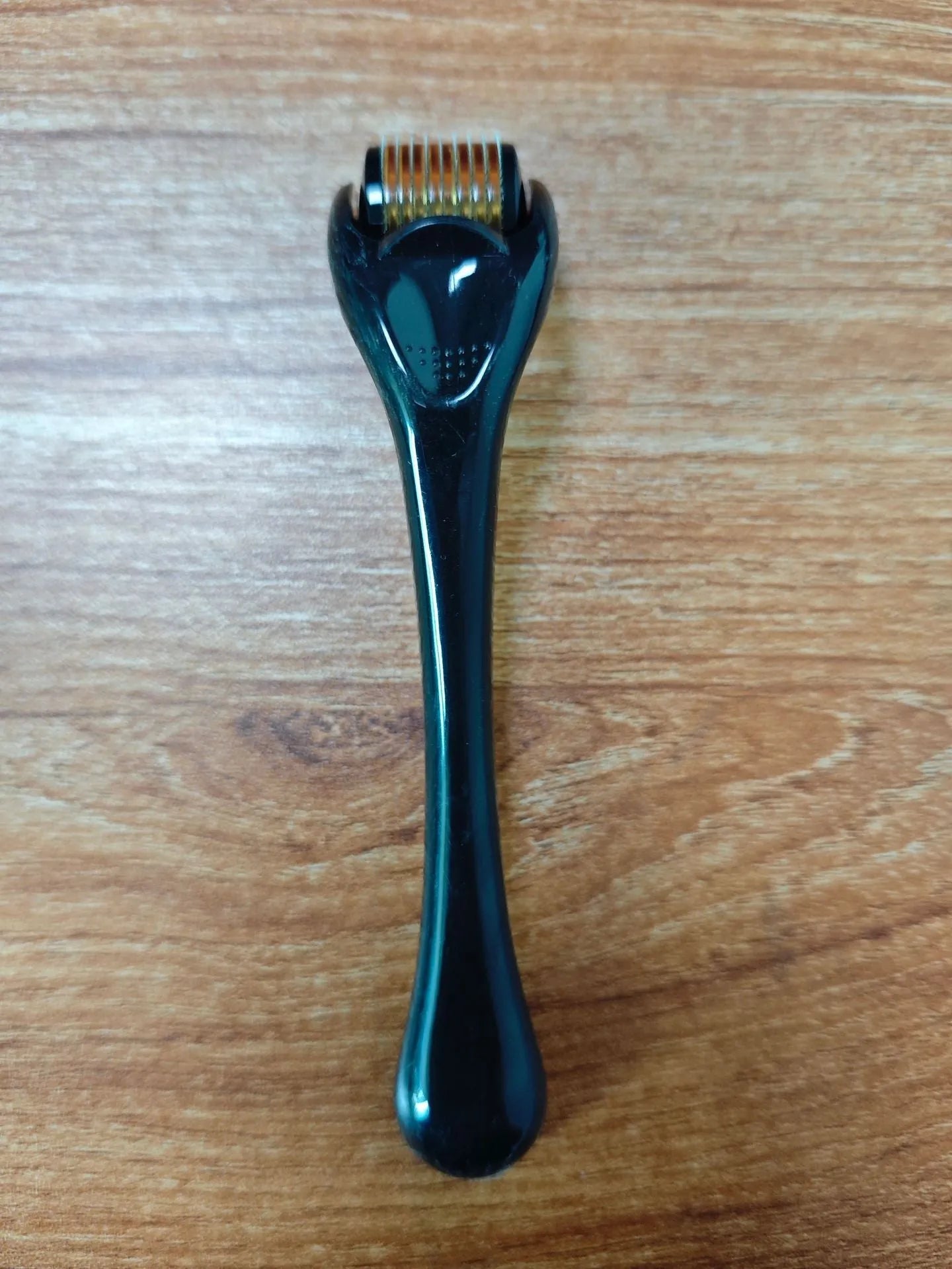 540 micro needle roller derma pen with coloured handle and wheel, shown with 0.2mm, 0.25mm, 0.3mm size options.