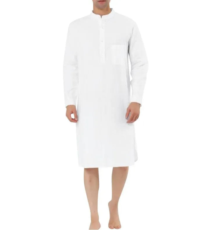 Man wearing a light blue cotton shirt-style robe with front pockets, showcasing casual loungewear.