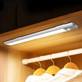 30cm smart LED strip human sensor light in silver with magnetic and self-adhesive mounting for wardrobe cabinet use
