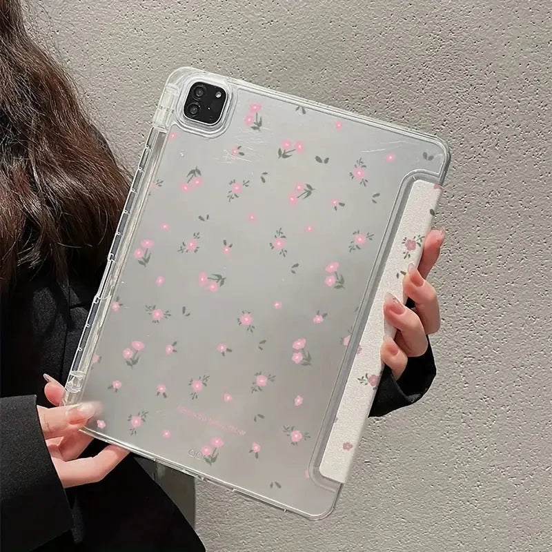 Transparent iPad case with floral cartoon pattern showing tri-fold stand position