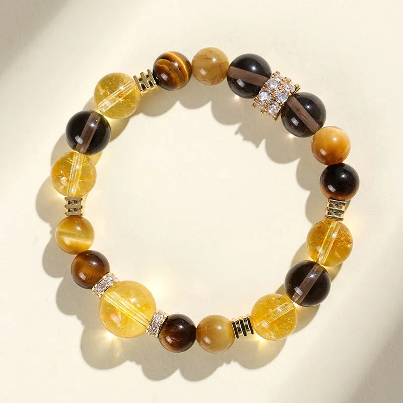 Natural yellow artificial crystal bead bracelet with 10mm Jinba beads in tower string design
