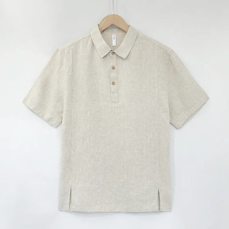 Men's loose fit linen summer top with short sleeves and thin lapels on a hanger.