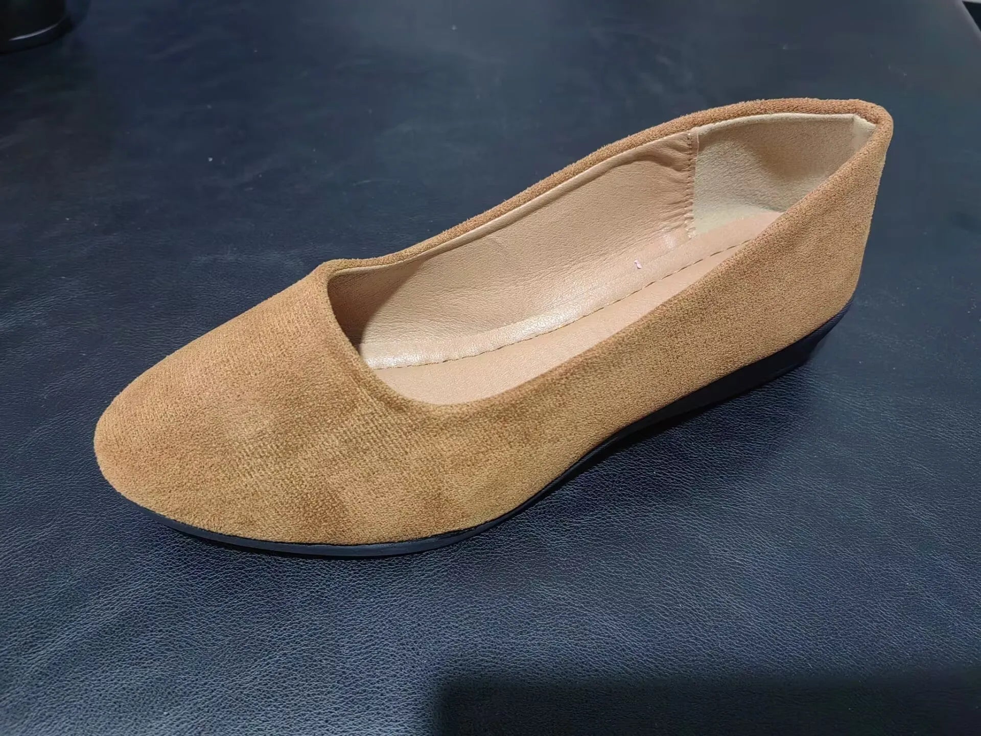 Women's pointed toe wedge pumps in suede with low wedge heel